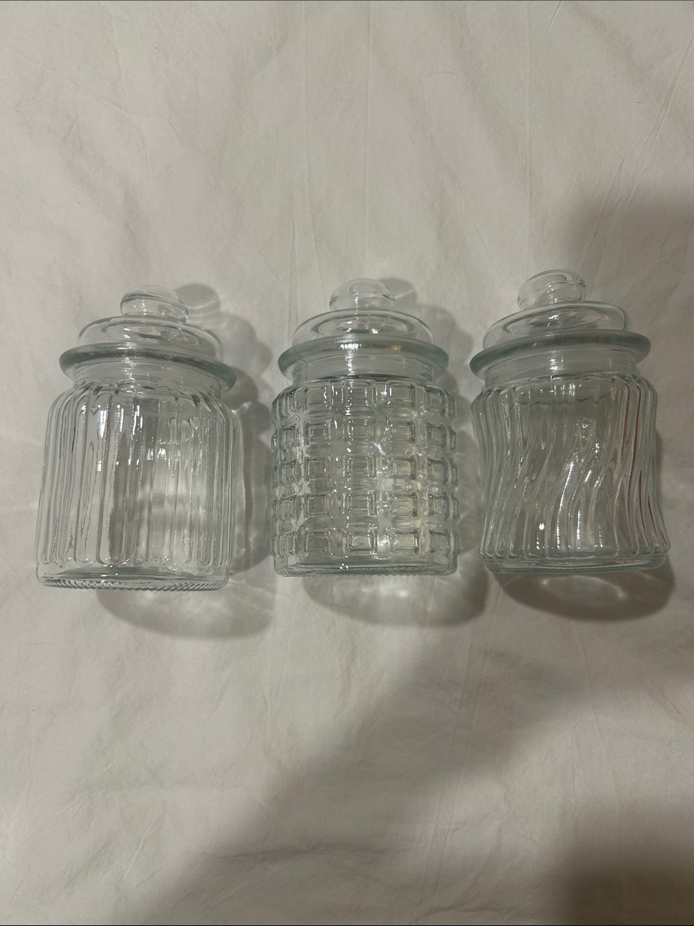 3 glass jars.